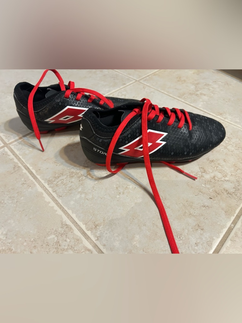 Lotto Kids' Black & Red Soccer Cleats - Lightweight Storm Design